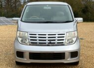 NISSAN ELGRAND 2007, HIGHWAY STAR, 2.5 V6 PETROL FULLY LOADED, 8 SEATER, ALLOYS, PEARL SILVER PAINT, BEIGE CLOTH INTERIOR