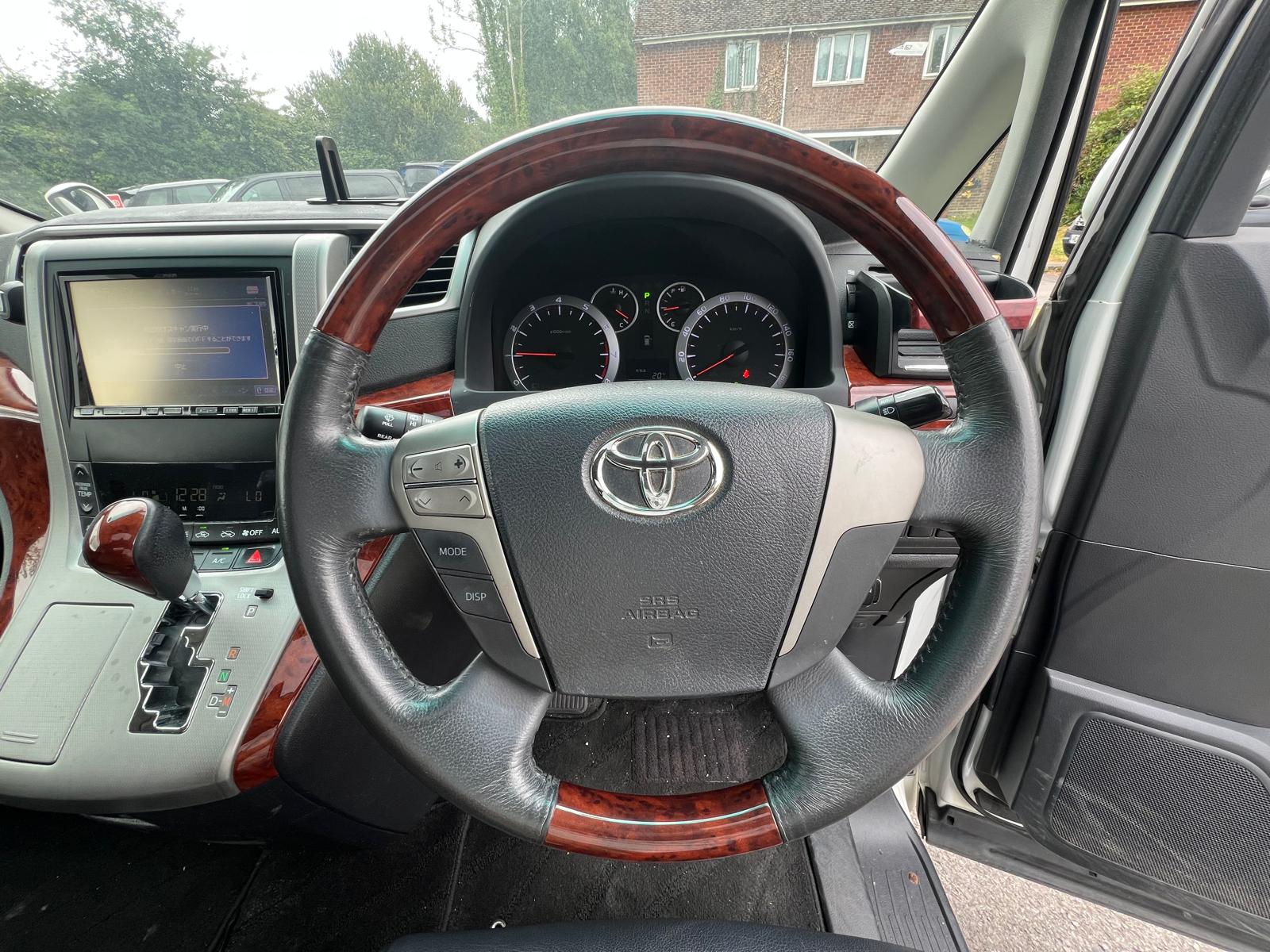 TOYOTA VELLFIRE 2010, 240Z PLATINUM SELECTION, 2.4 PETROL FULLY LOADED, 7 SEATER, WHITE PEARL CRYSTAL SHINE PAINT, BLACK LEATHER INTERIOR
