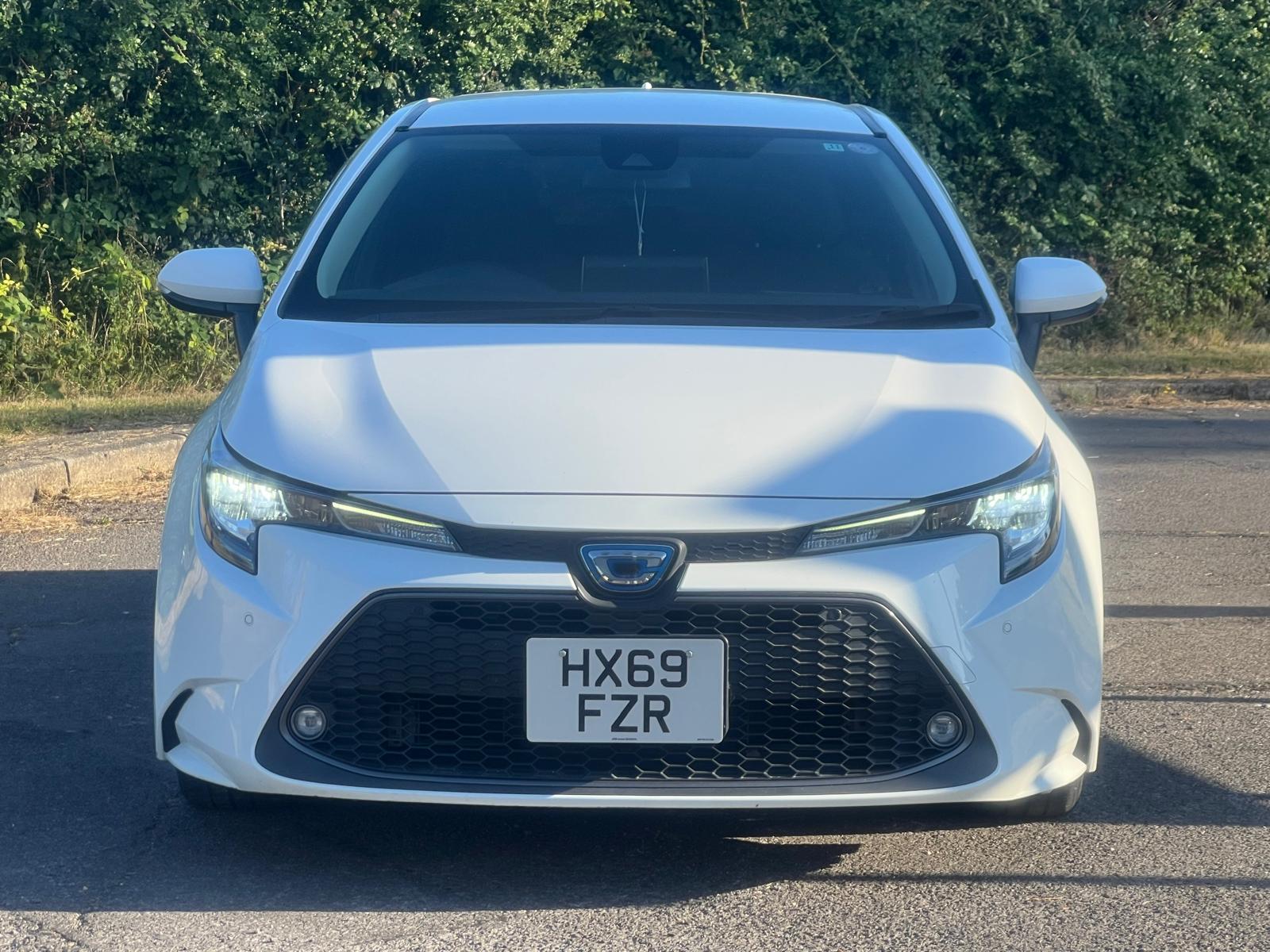 TOYOTA COROLLA TOURING 2019, 1.8 PETROL HYBRID FULLY LOADED, 5 SEATER, PEARL WHITE PAINT, BLACK CLOTH INTERIOR