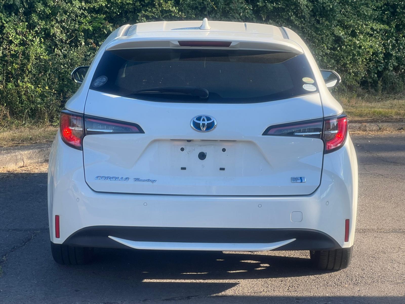 TOYOTA COROLLA TOURING 2019, 1.8 PETROL HYBRID FULLY LOADED, 5 SEATER, PEARL WHITE PAINT, BLACK CLOTH INTERIOR