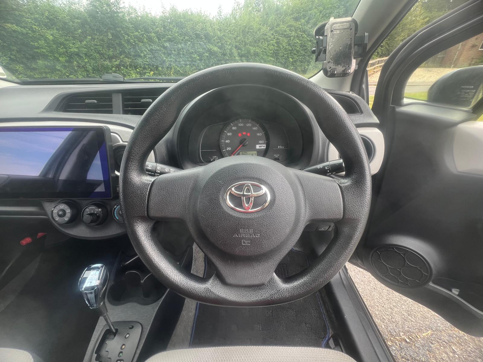 TOYOTA VITZ 2011, 1.0 PETROL FULLY LOADED, 5 SEATER, PEARL GREY PAINT, BLACK / BEIGE CLOTH INTERIOR