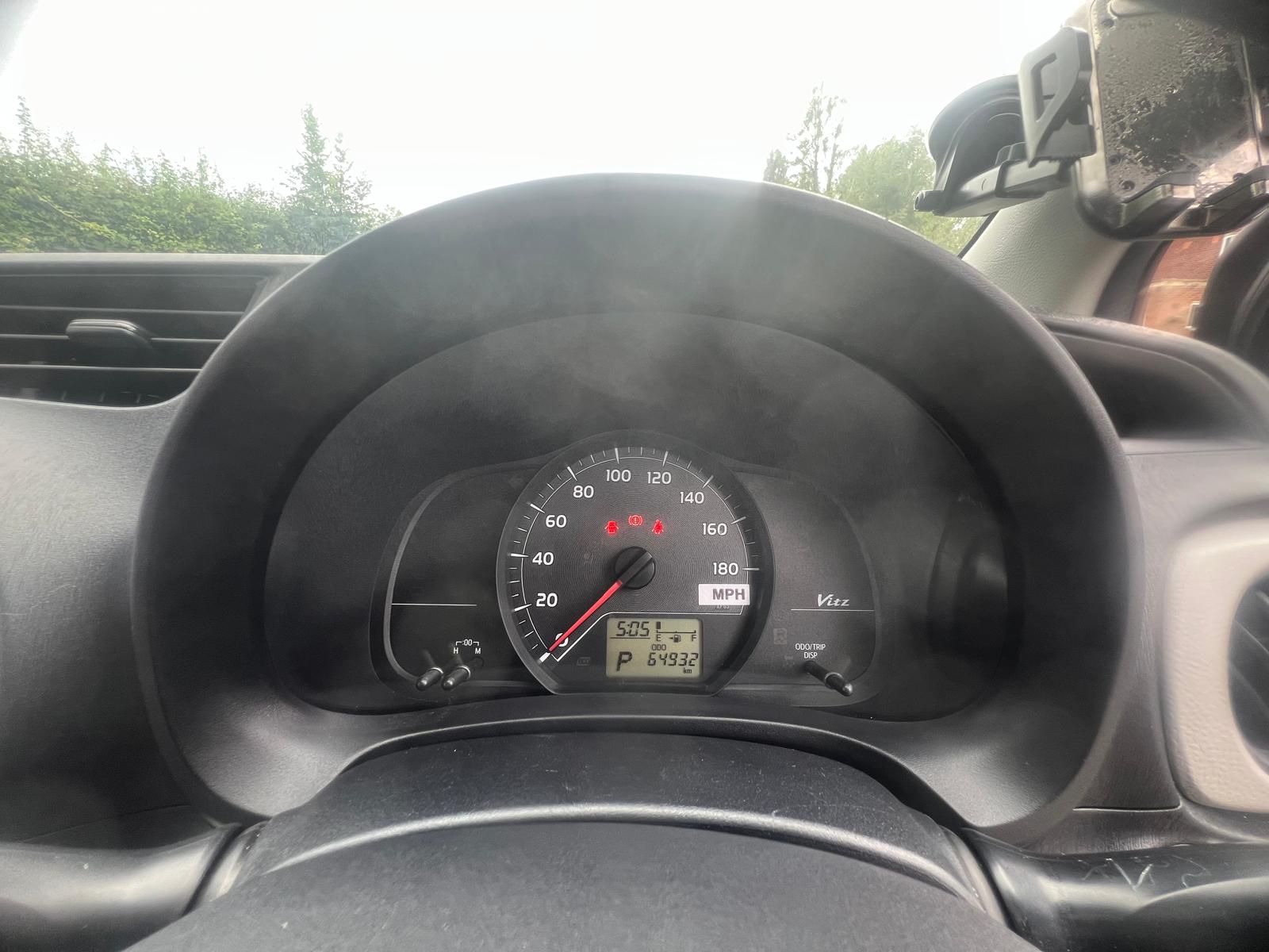 TOYOTA VITZ 2011, 1.0 PETROL FULLY LOADED, 5 SEATER, PEARL GREY PAINT, BLACK / BEIGE CLOTH INTERIOR